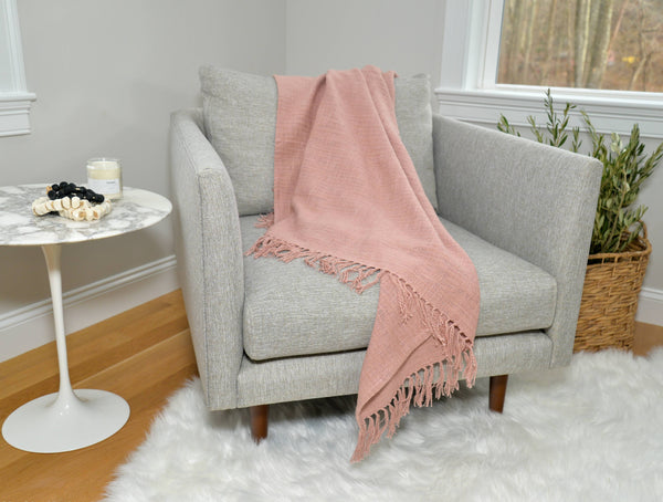 Simple timeless comfortable hand woven dusty rose cotton throw.